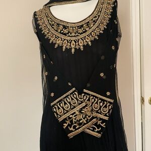 Elegant Black and Gold Embellished Dress